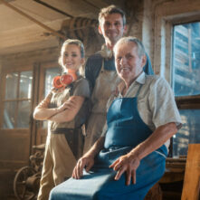Generations of carpenters in their family business workshop